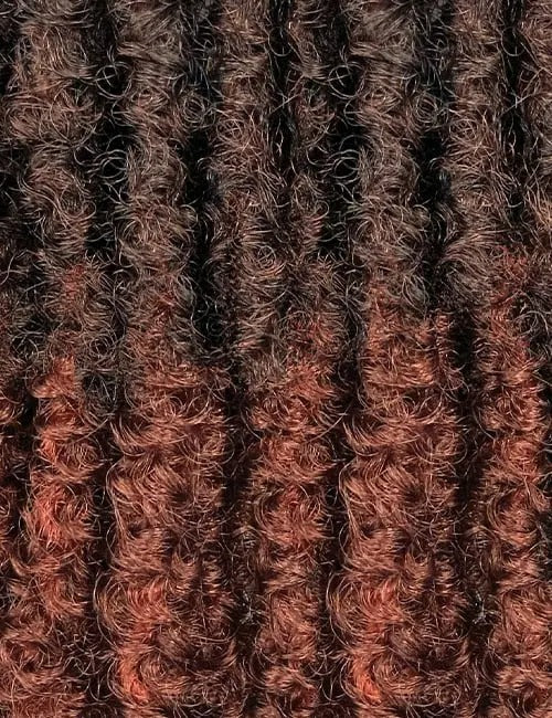 Close-up of OUTRE X-Pression Natural Kinky Twist hair braids with curly texture and ombre brown color