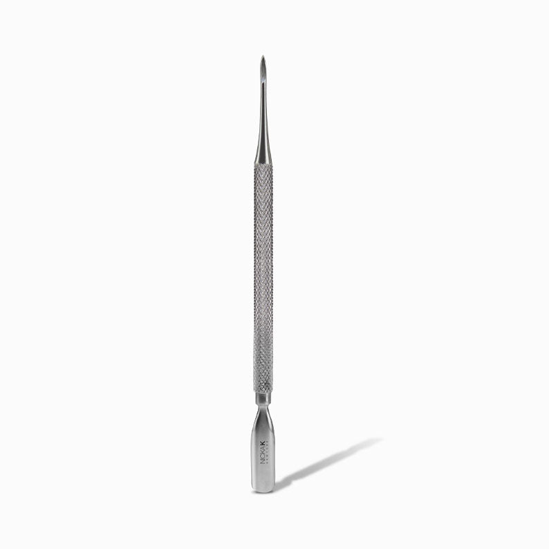NICKA K stainless steel cuticle pusher with textured grip double ended pointed tip and angled pusher