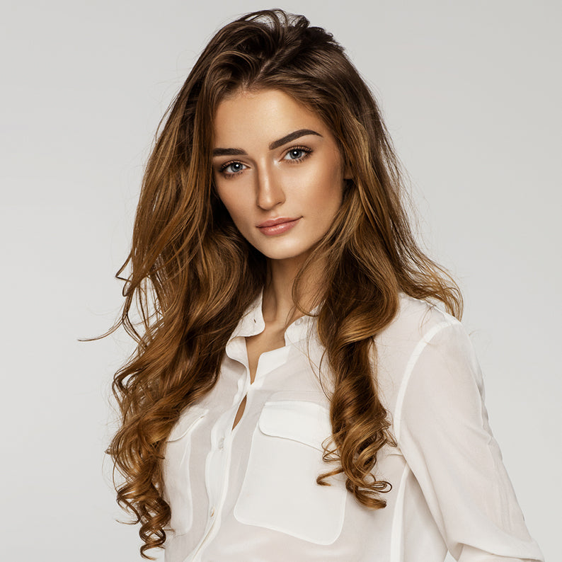 ANNIE extra long ceramic curling iron creates loose salon waves on model with long brown hair