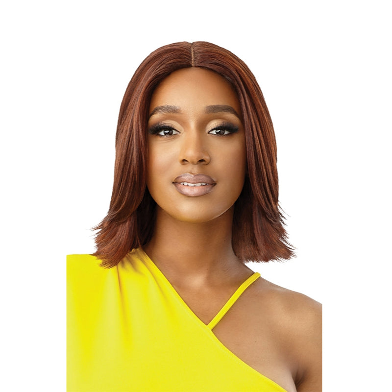 OUTRE synthetic lace front wig 12 inch in a sleek brown bob style on a model wearing yellow