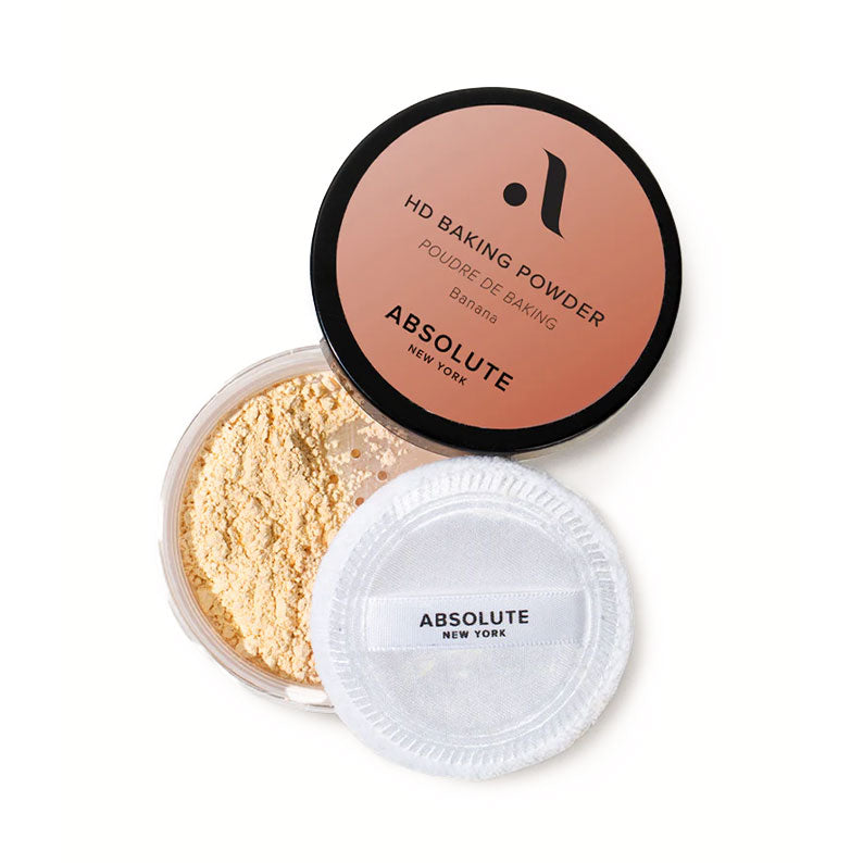 Absolute New York HD baking powder jar in banana shade with powder puff and sifter banana setting powder for makeup