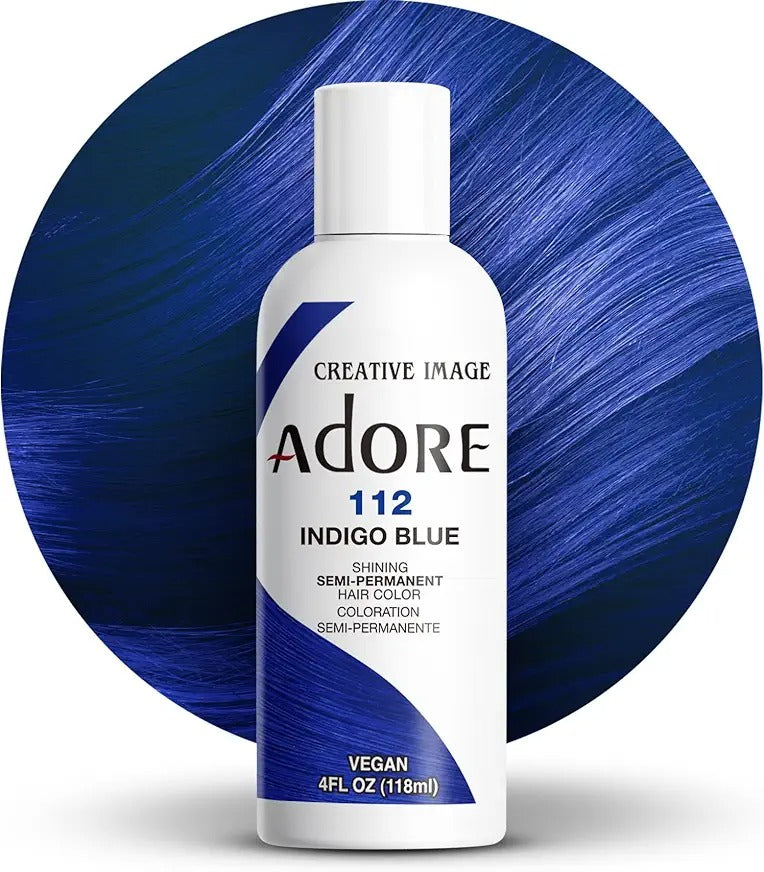 ADORE Creative Image Indigo Blue 112 semi permanent hair color bottle with vibrant blue hair background