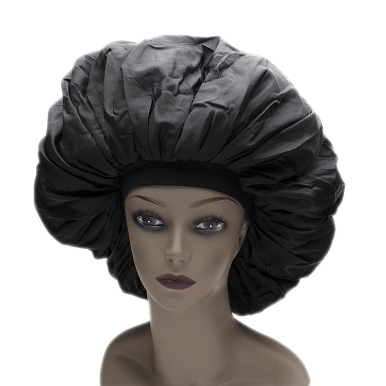 ANNIE extra jumbo satin sleep cap in black on mannequin for hair protection and moisture retention