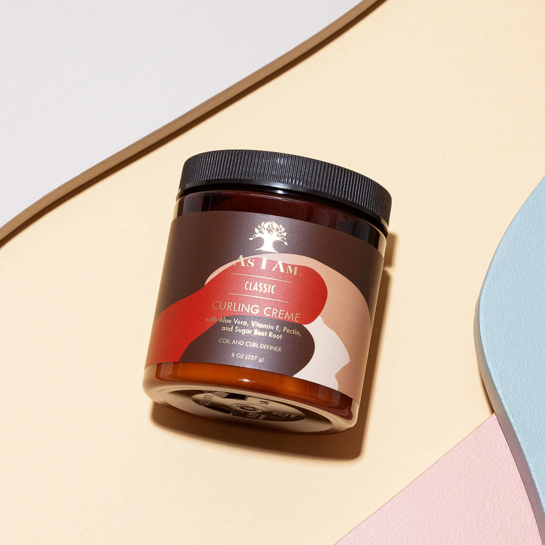 AS I AM classic jar of curly hair curling cream in amber container with black lid on pastel background