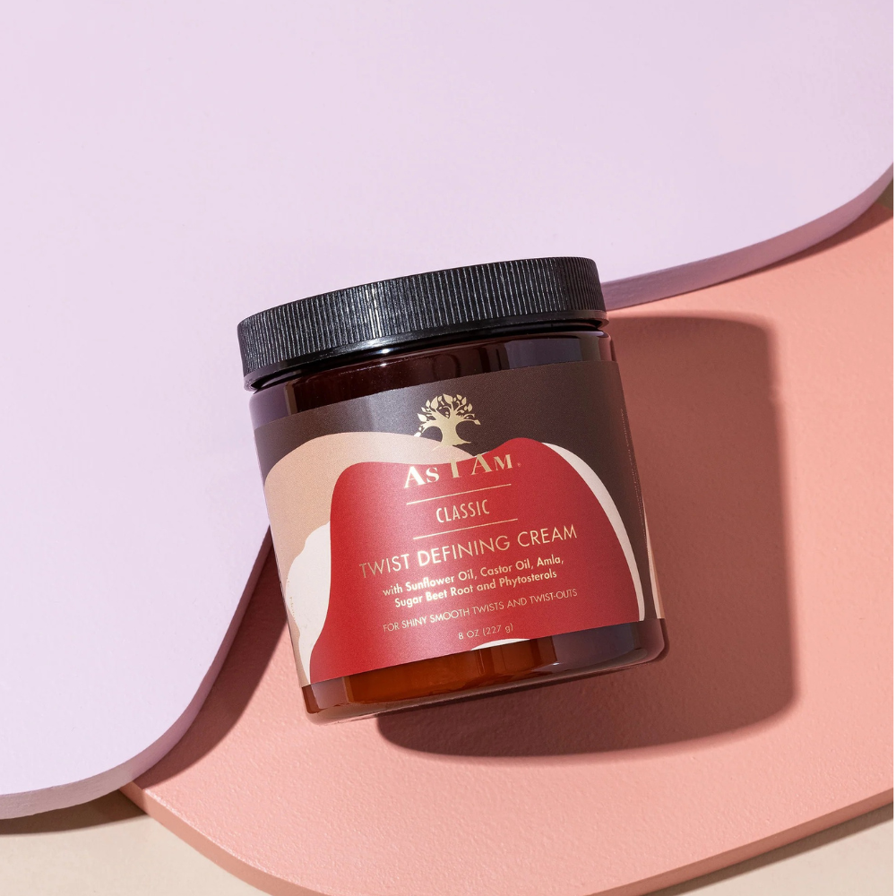 AS I AM jar of twist defining cream for natural hair in amber container with black lid on pastel background