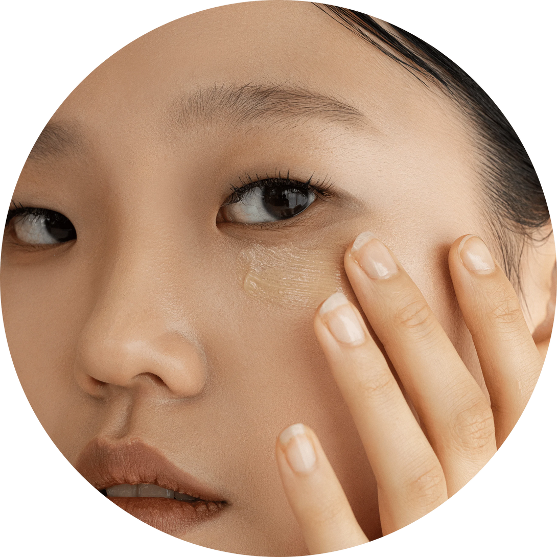 Beauty of Joseon model applying ginseng retinal eye serum under eye to hydrate and brighten