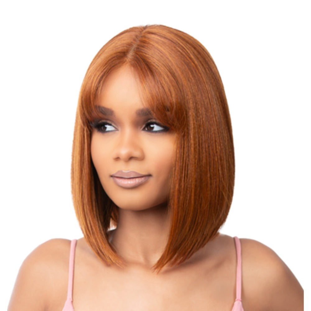 Bff Part Lace Lilia wig sleek auburn angled bob with center part and soft curtain bangs on model