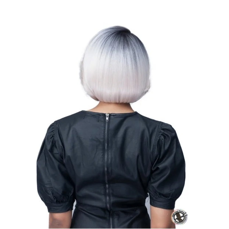 BOBBI BOSS Boss Lace 13X5 HD wig short silver ombre bob with dark roots shown from back on model wearing black dress