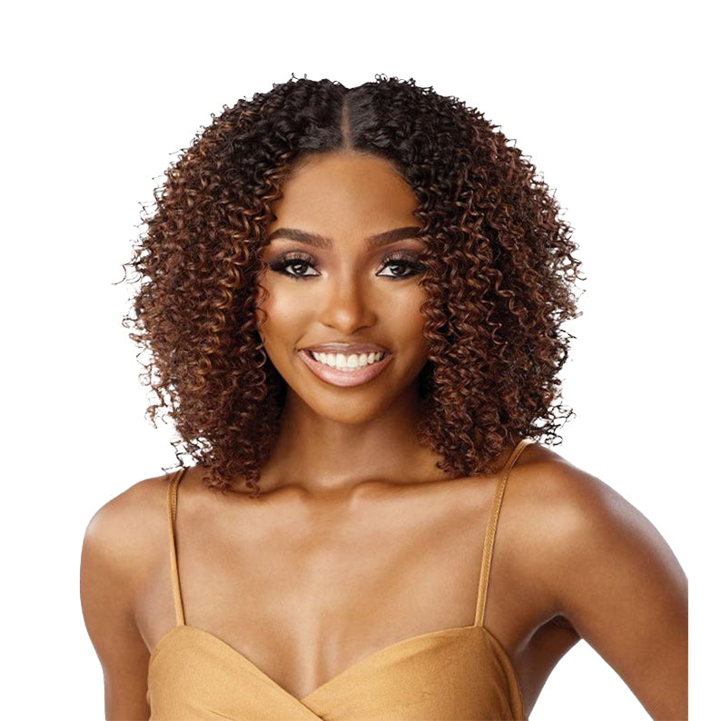SENSATIONNEL Butta Lace HD lace front wig curly shoulder length brown ombre with center part on model