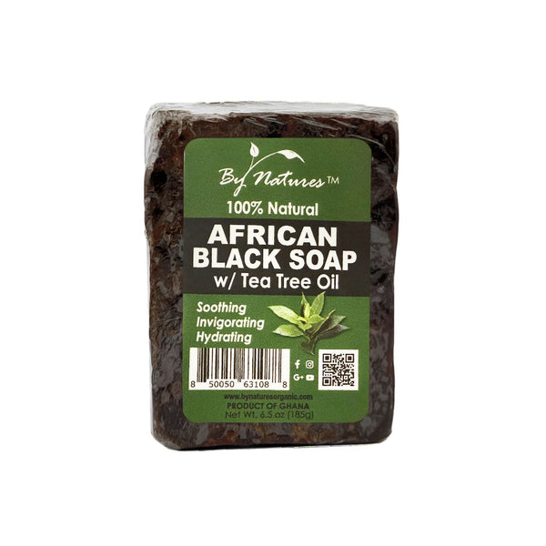 By Natures bar of African black soap with tea tree oil in green labeled wrap for soothing skin care