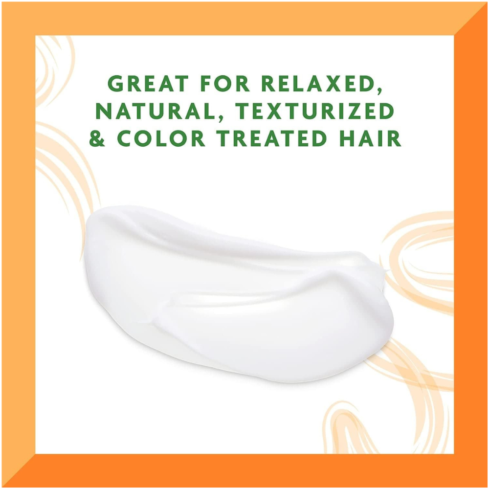 Cantu hair care cream smear showing white cream for relaxed natural texturized and color treated hair