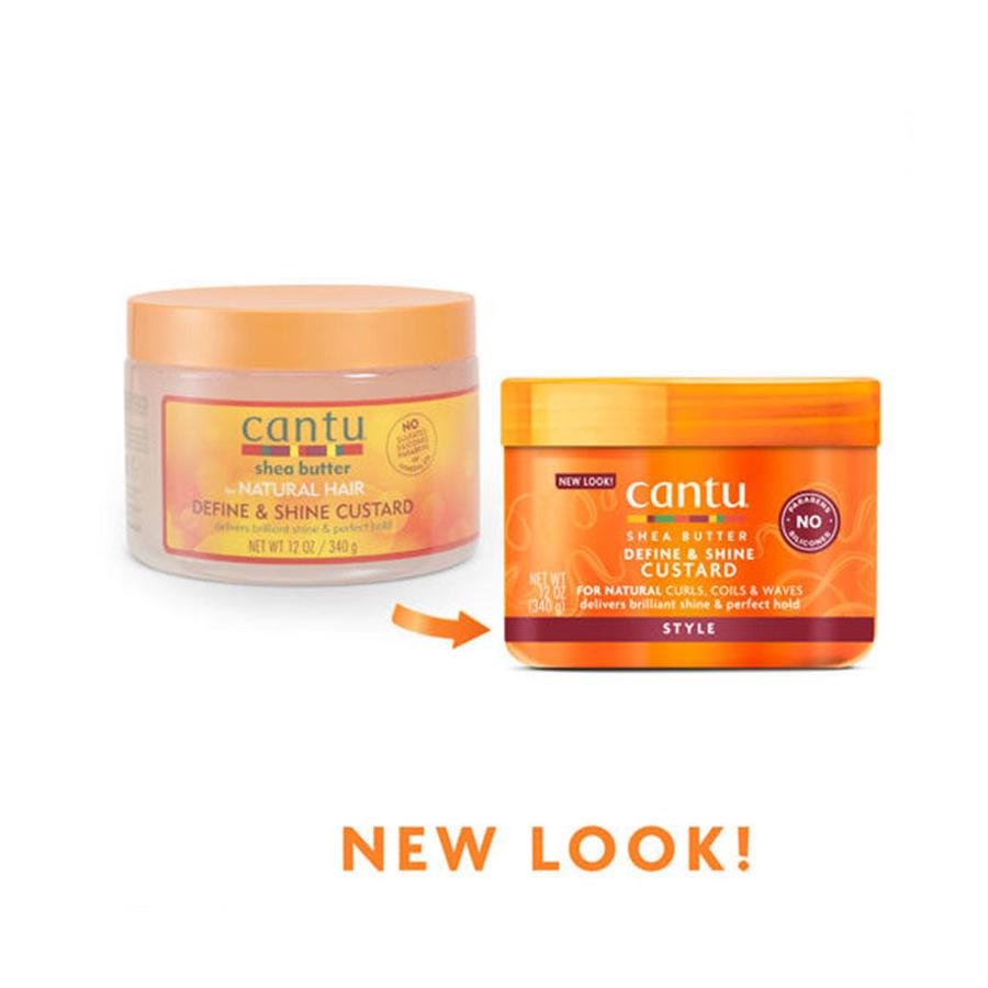 Two orange Cantu shea butter jars showing old and new packaging for curl defining custard hair care