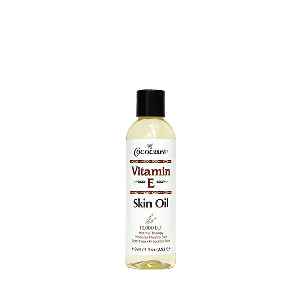 COCOCARE Vitamin E skin oil for face in clear 4 fl oz bottle with black cap moisturizing formula