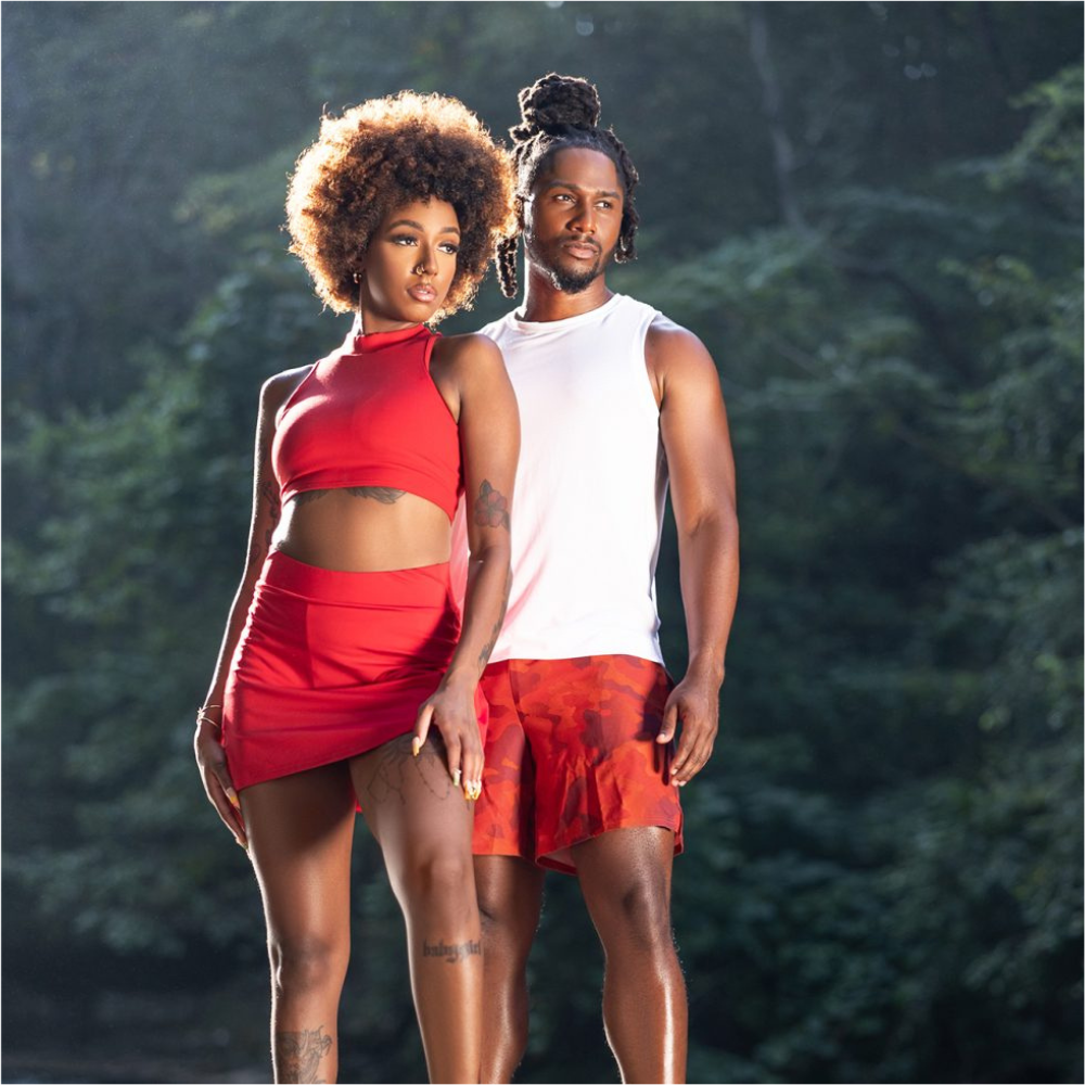 CREME OF NATURE sulfate free argan oil shampoo shown with two models with textured hair outdoors