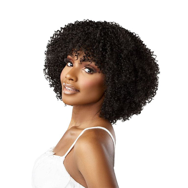 SENSATIONNEL curly bob lace front wig in natural black on model showing short textured curls and fringe