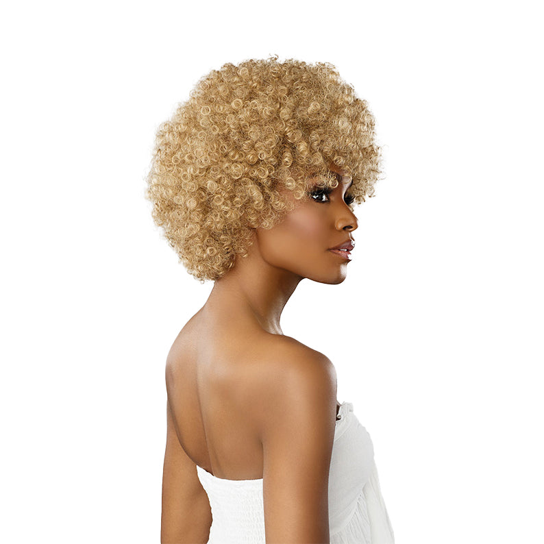 SENSATIONNEL synthetic afro curly wig in honey blonde on model side profile with short tight curls