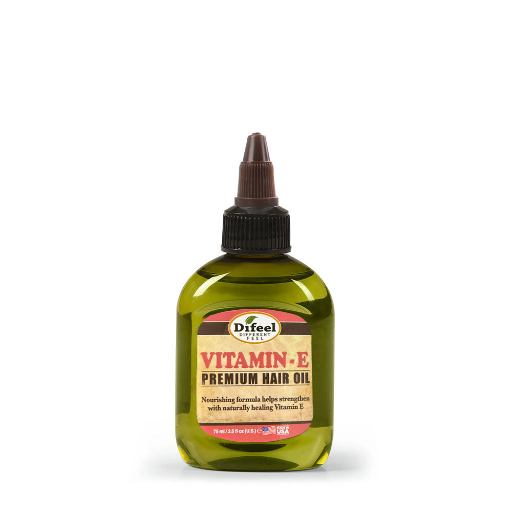 DIFEEL sunflower hair oil with vitamin E in green squeeze bottle with pointed applicator cap