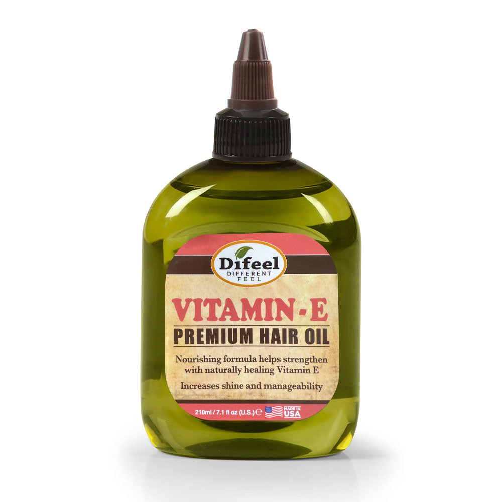 DIFEEL vitamin E hair oil in green squeeze bottle with pointed applicator cap and premium nourishing label
