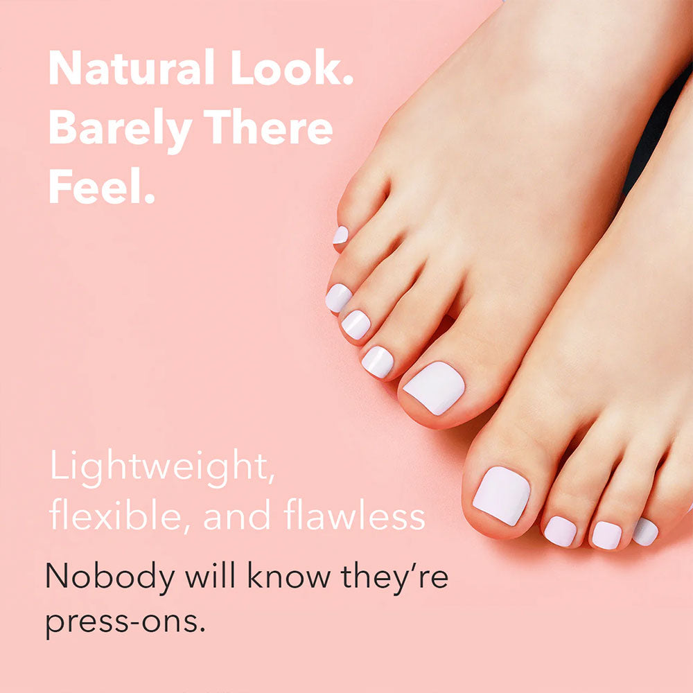 EBIN baby pink 3D press on toenails on natural toes against a soft pink background