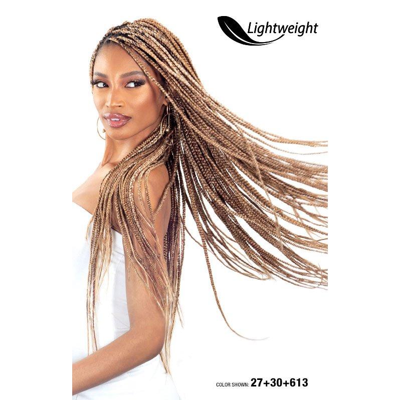 SHAKE N GO Freetress Aerolite Braid 52 inch lightweight braids in blonde mix color on model