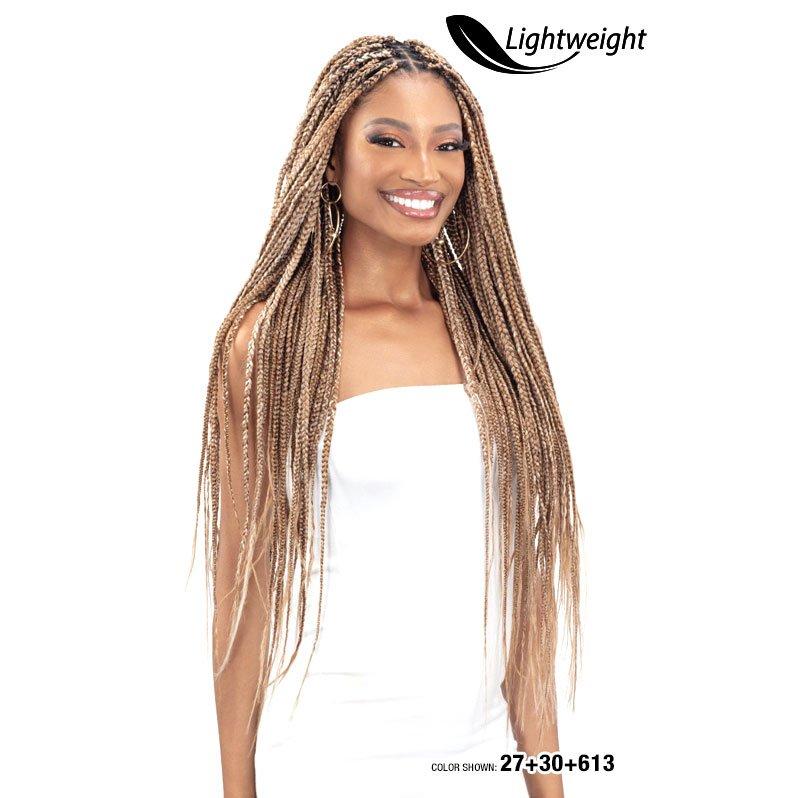 Woman wearing long blonde Freetress Aerolite Braid 52 inch lightweight braids by Shake N Go
