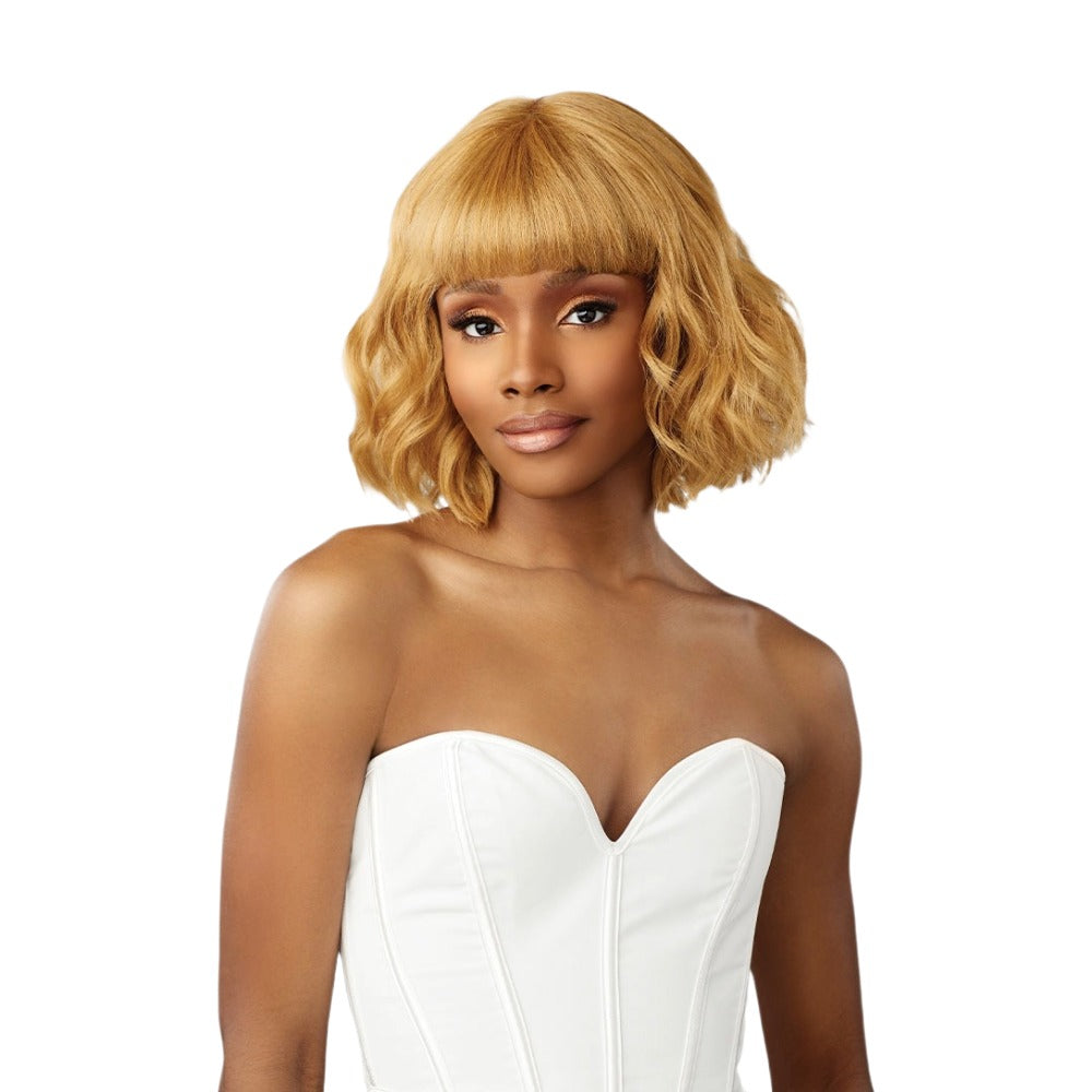 Sensationnel blonde lace front wig with wavy texture and bangs, perfect for stylish looks