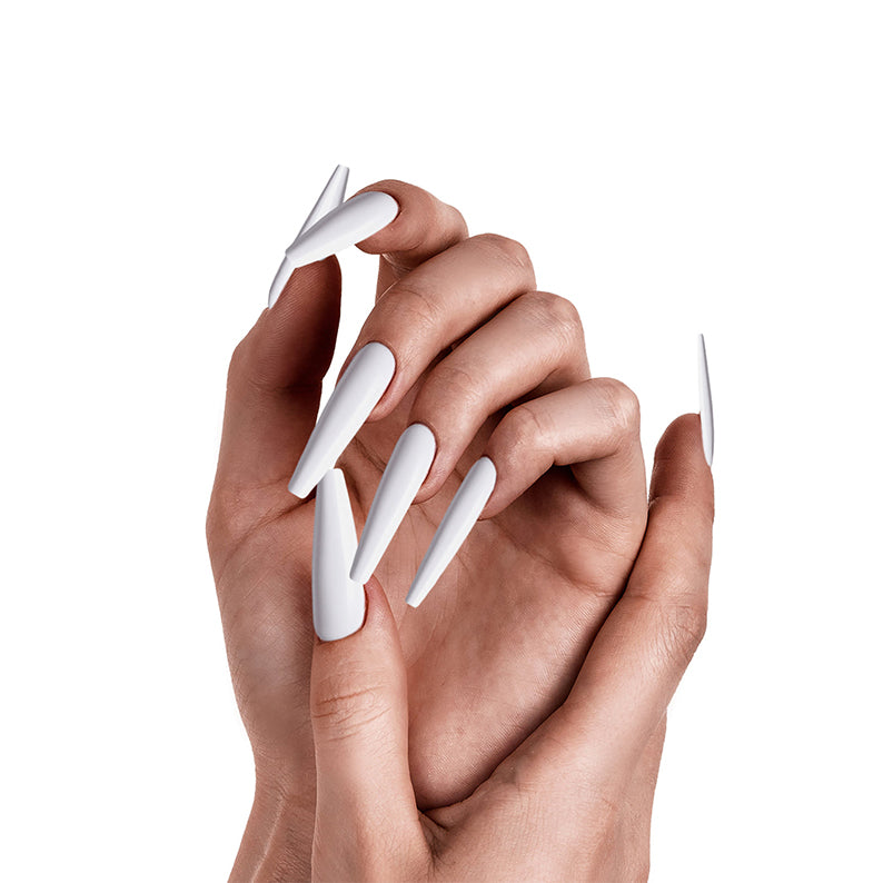 IVY BEAUTY by KISS long white stiletto solid color press on nails on female hands showing glossy finish