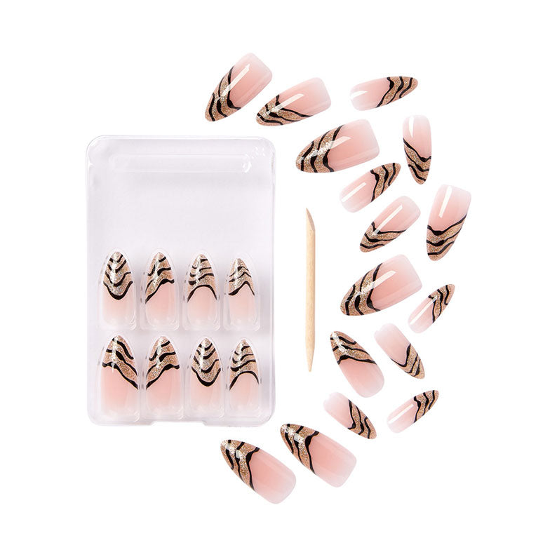 IVY BEAUTY by KISS gold finger trendy press on nails set nude pink with gold and black zebra stripe accents and applicator stick