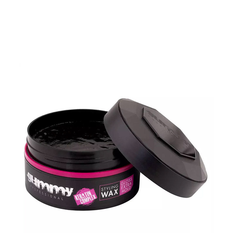 GUMMY extra hold hair wax open black container with pink label for styling and gloss