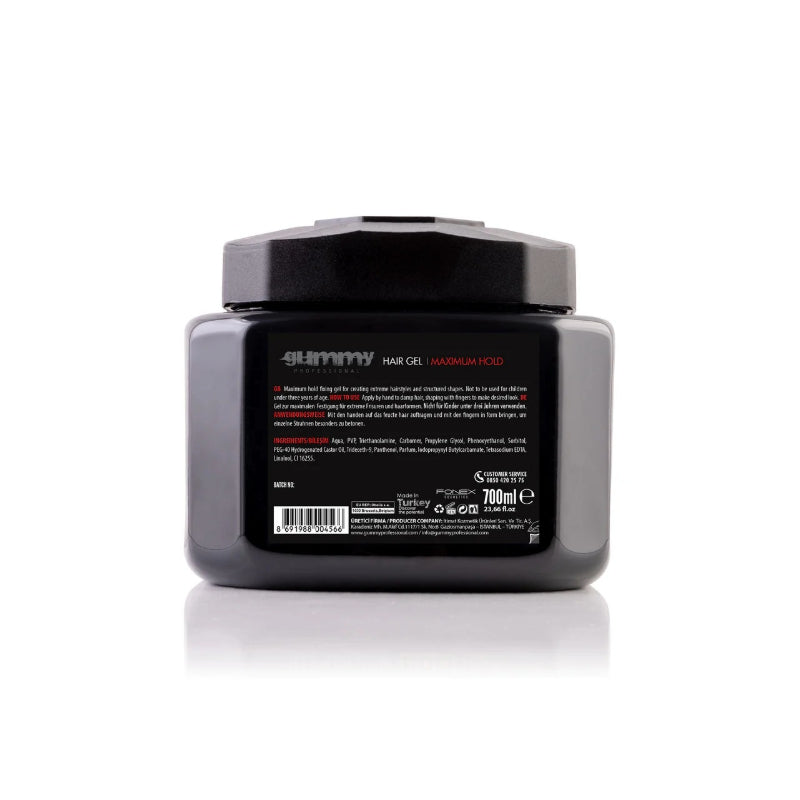 Gummy maximum hold hair gel in black container with detailed product label and 700ml size
