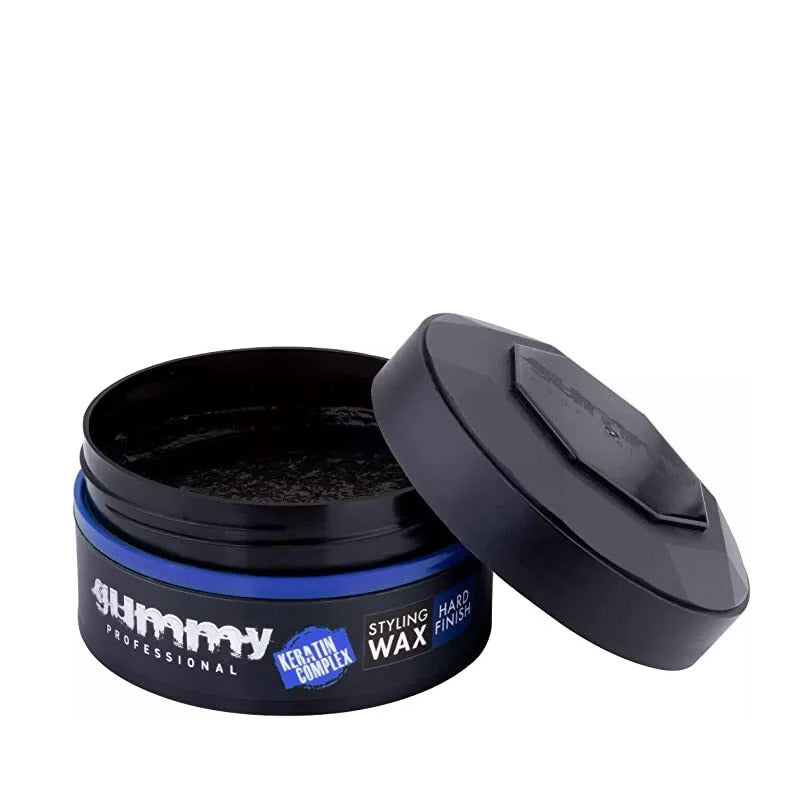 Gummy styling wax hard finish black tub with open lid showing dark wax texture for strong hold styling