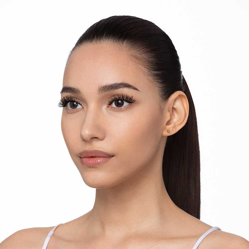 IVY BEAUTY by KISS model wearing human hair wispy false lashes natural glam makeup closeup