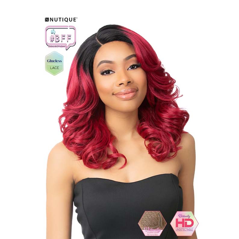 Model wearing a red shoulder length wavy wig with dark roots and side part HD lace front wig