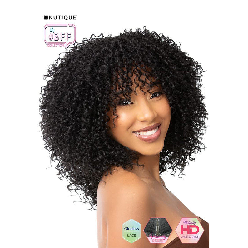 Model wearing undetectable HD lace front wig black tight curls shoulder length with natural hairline
