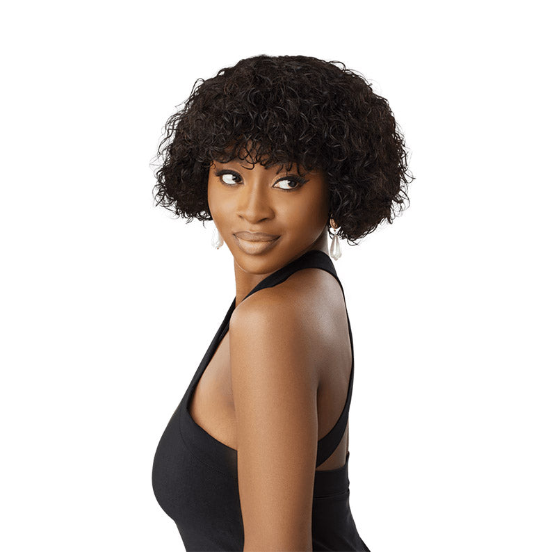OUTRE 10 inch unprocessed human hair wig short curly black bob with bangs on model