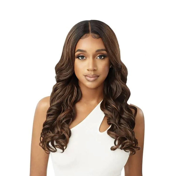 OUTRE 22 inch lace front wig with long voluminous loose curls in dark brown on model