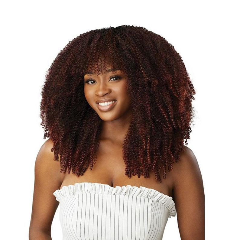 OUTRE afro clip in hair extensions in deep burgundy tight curls with full fringe on model
