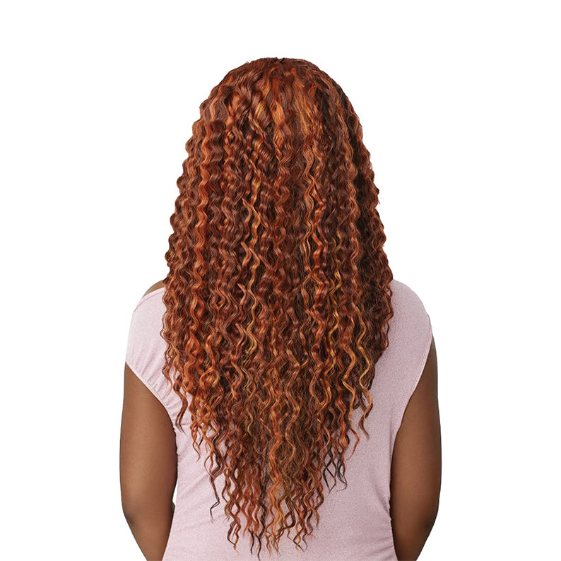 OUTRE lace frontal wig with swoop bangs long copper auburn deep curly waves back view on model