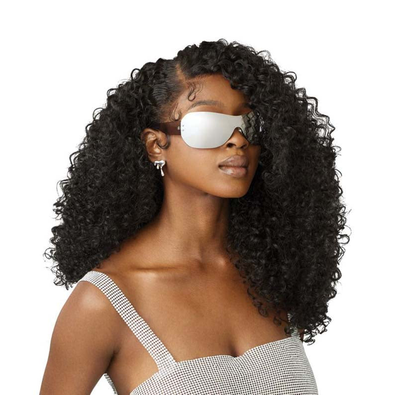 OUTRE curly black Melted Hairline lace front wig. Model with side part, defined baby hairs and sunglasses