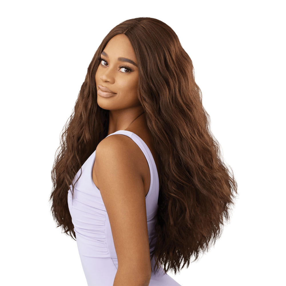 Outre The Daily Wig long wavy chestnut brown wig on model with natural center part and soft waves