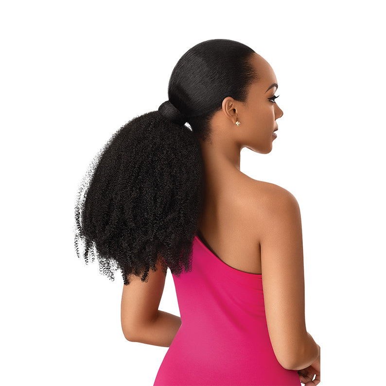 Outre springy afro wrap ponytail attached to sleek low ponytail showing natural textured volume and protective style