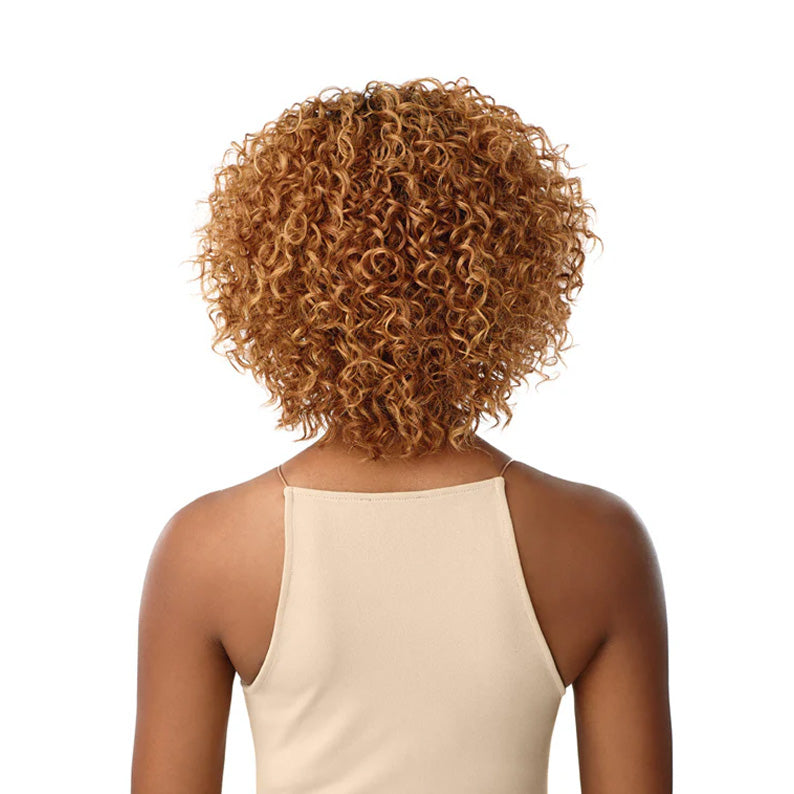 OUTRE short curly honey blonde synthetic hair full cap wig shown from back on model wearing tank