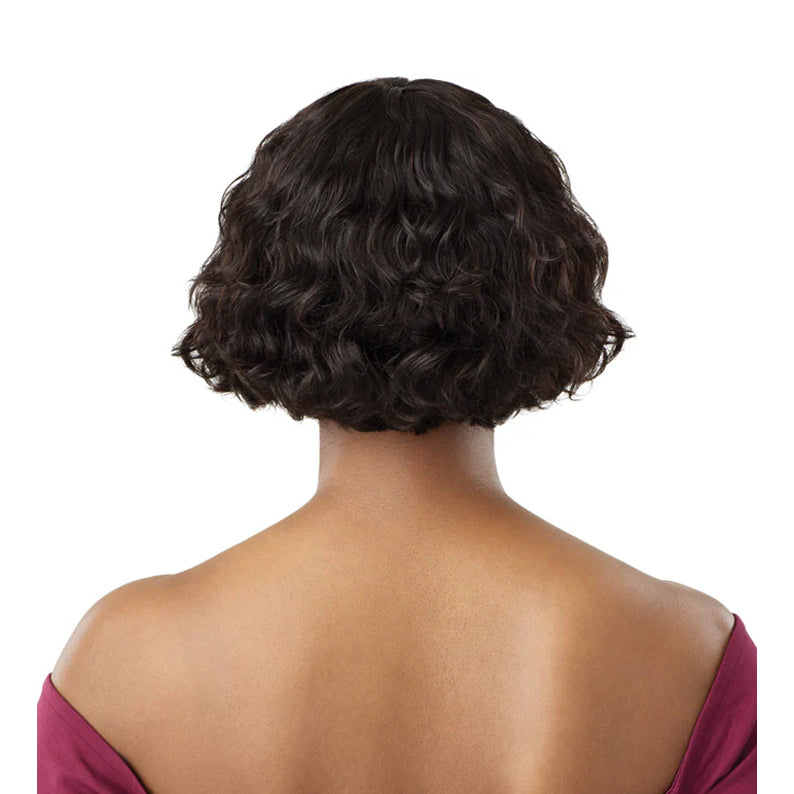 OUTRE unprocessed human hair wig short wavy bob back view dark brown shoulder length on model