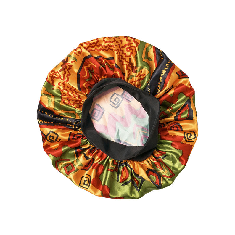 RED BEAUTY by KISS extra large silky bonnet for braids in orange and green print with elastic band