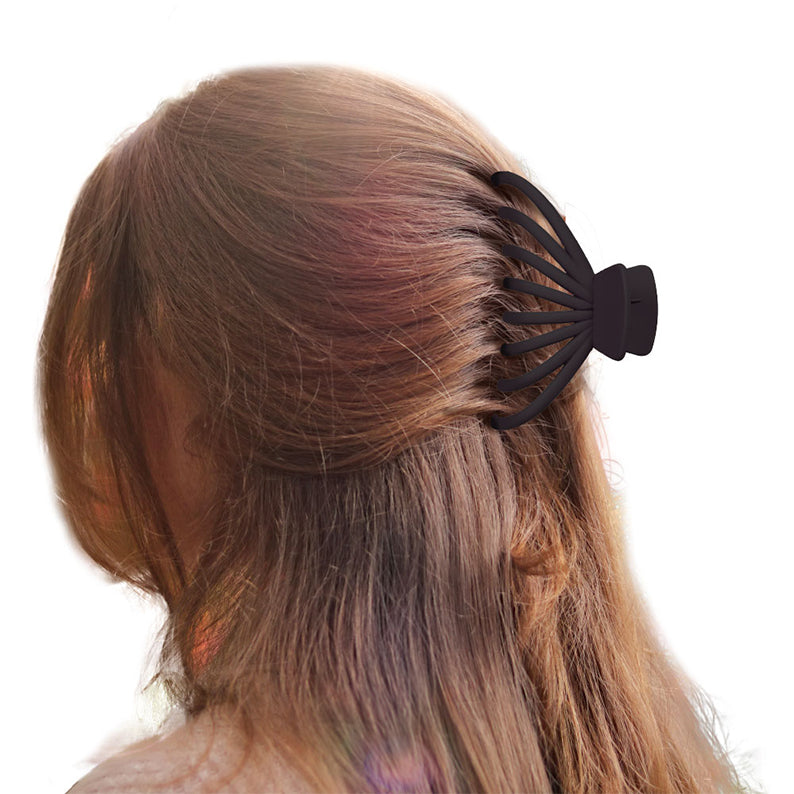 RED BEAUTY by KISS jumbo matte butterfly claw clip in black holding thick hair in a half up style for secure hold