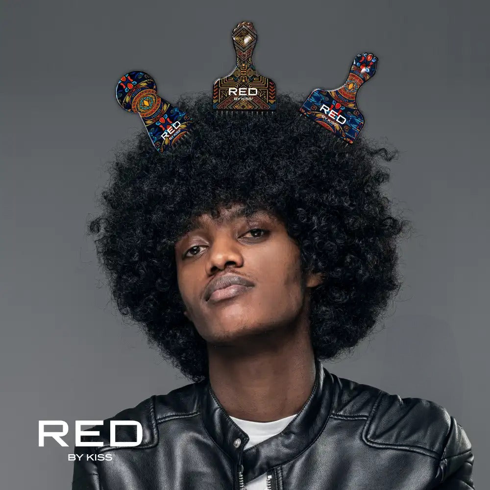 Man with large afro and leather jacket wearing three RED BEAUTY long afro pick combs in hair