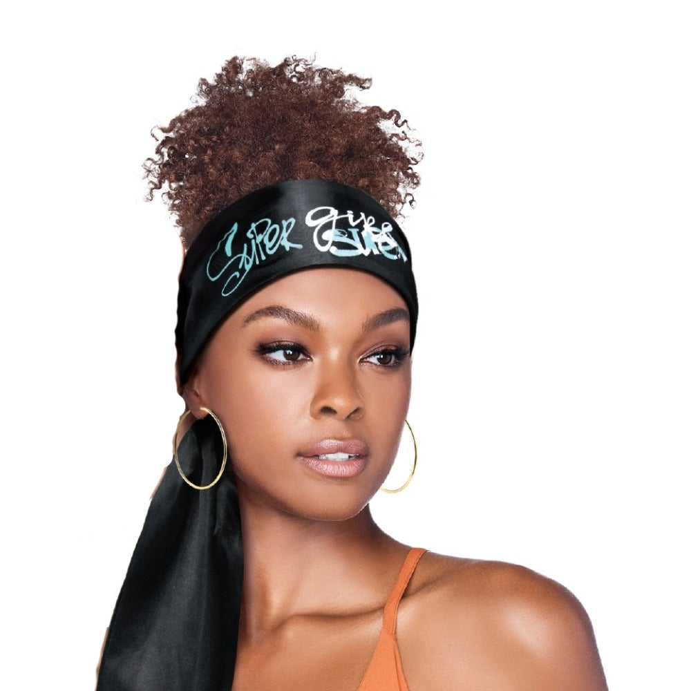 RED BEAUTY by KISS silky satin edge scarf black headwrap tied at back with graffiti print worn by model