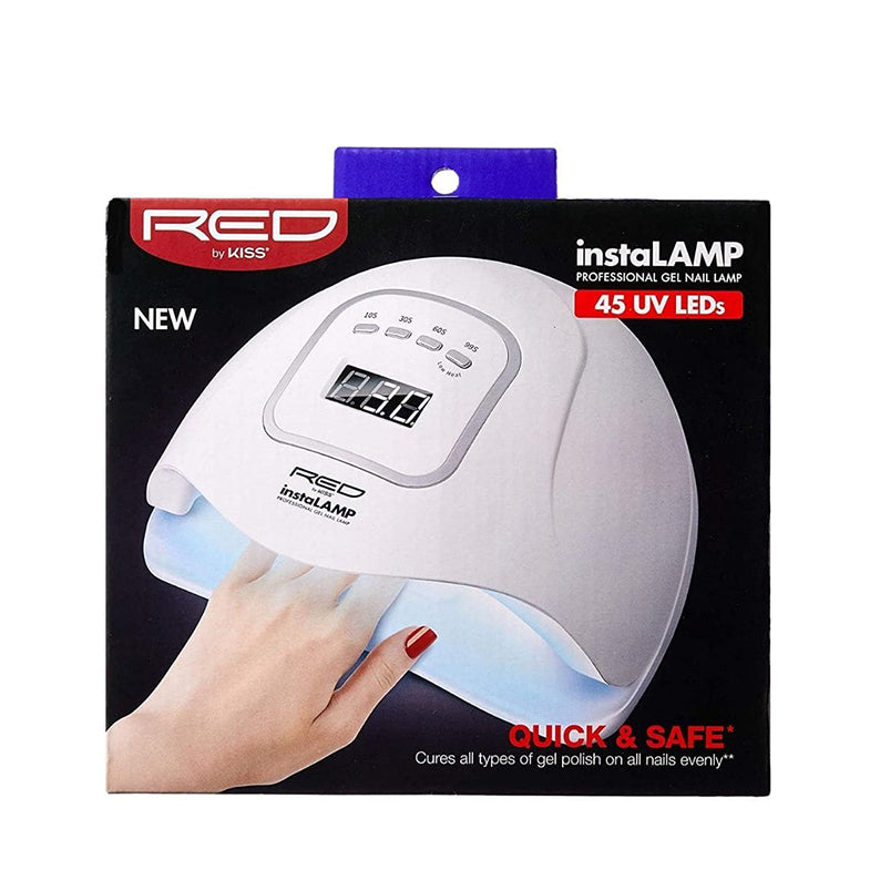 RED BEAUTY by KISS white instaLAMP LED nail dryer showing hand inside UV gel nail lamp for home use.