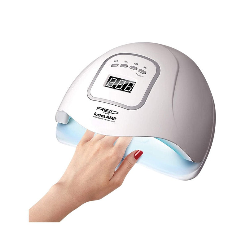 RED BEAUTY by KISS white UV gel nail lamp for home use. Digital timer and LED curing light with hand inside