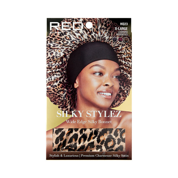 Product packaging showing model wearing RED BEAUTY by KISS extra large silky bonnet leopard print with wide black edge